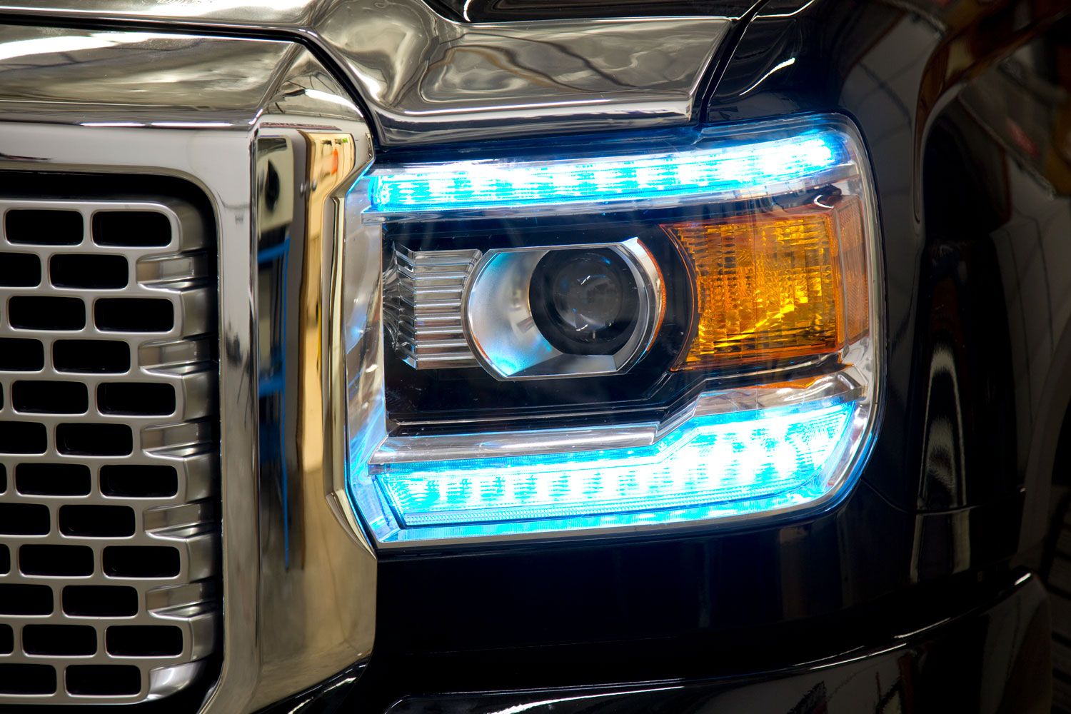 2014-2015 GMC Sierra with RGBW DRL LED Boards in cyan